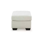 Pouf Ashley Ammon de la collection Signature Design, rembourrage en polyester cordé, ivoire